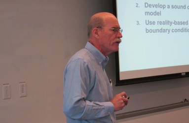 Pete Shanahan discusses modeling fundamentals with U.S. NRC staff at the 2015 training course.