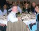 John Till (right) and Helen Grogan (2nd from right at front) at the Members' Dinner during the 2019 NCRP annual meeting